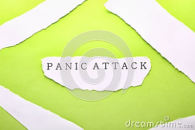 Piece of paper with text PANIC ATTACK on color background Stock Photo