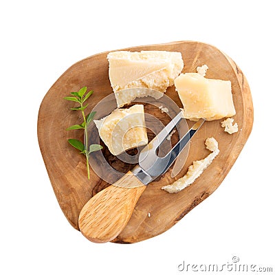 Piece of parmesan cheese on wooden board isolated on white. Parmigiano Reggiano, hard mature cheese. Top view Stock Photo
