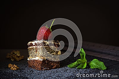 Piece of poppy seed cake with strawberry and mint Stock Photo