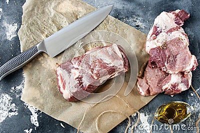 Piece of raw meat on the table Stock Photo