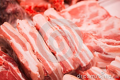 A piece of raw pork closeup. Sale of meat. Butcher shop. Pork in Stock Photo