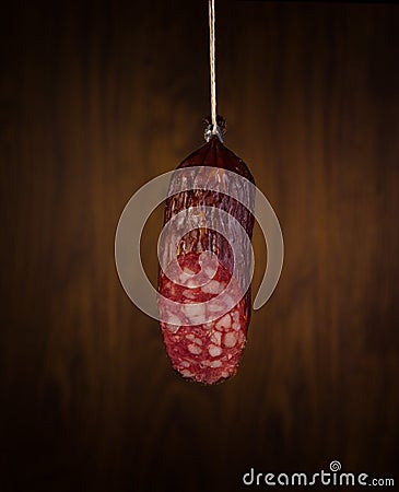 A piece salami sausages Stock Photo