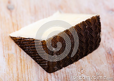 Piece of spanish hard cheese Anejo from sheep milk Stock Photo