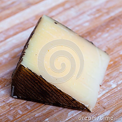 Piece of spanish hard cheese Anejo from sheep milk Stock Photo