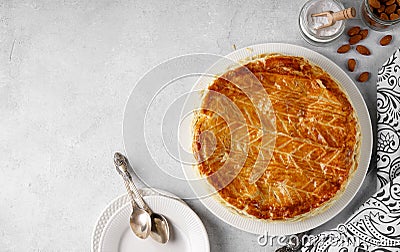 A piece of traditional French galette des rois Stock Photo