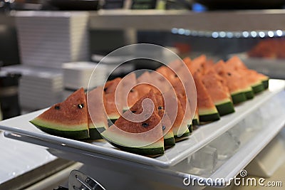 Piece of watermelon in the buffet line Stock Photo