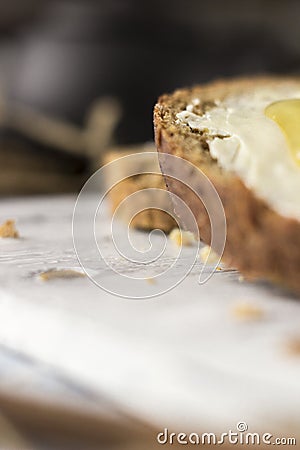 Pieces of bread with butter and honey, macro Stock Photo