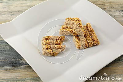 Pieces of broken sesame brittle bar Stock Photo