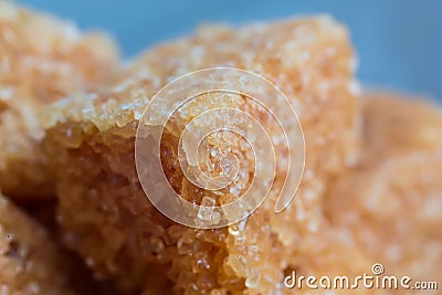 Pieces of brown pressed refined sugar. Stock Photo