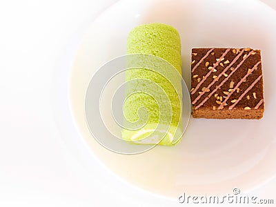 caramel coffee cake and pandan flavor roll cake Stock Photo