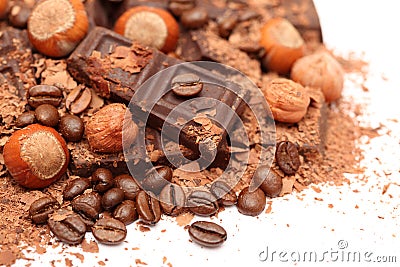 Pieces of chocolate with hazelnuts and coffee beans Stock Photo