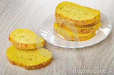 Pieces of cornbread on table, stack from slices of corn bread in plate Stock Photo