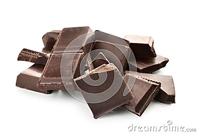 Pieces of dark chocolate on white background Stock Photo