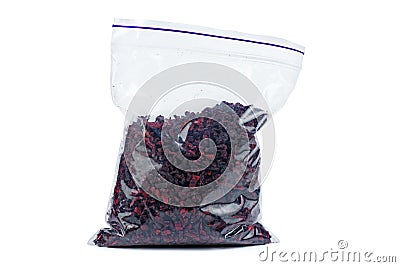 Pieces dried red beetroot in plastic packet isolated on white Stock Photo