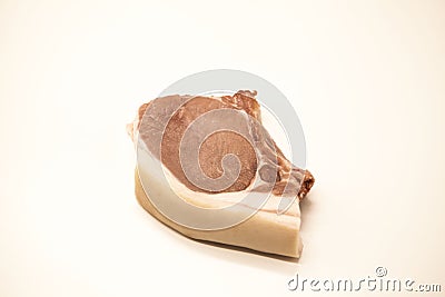 Pieces of fresh raw pork appetizing close-up on a white background. Stock Photo