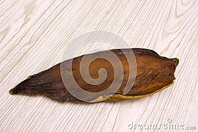 Pieces smoked fish on a white background . Stock Photo