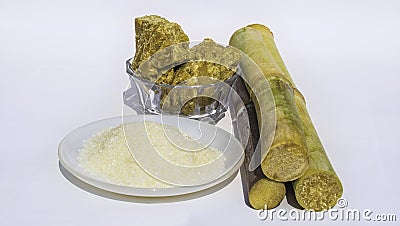 Pieces of sugarcane with white sugar Stock Photo