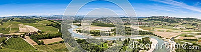 Piemontese landscape including the Tanaro river and the Alps shot from the tower of Barbaresco Stock Photo