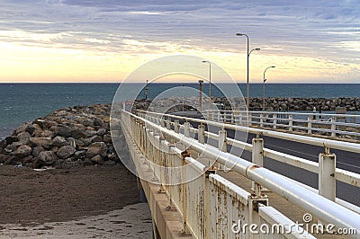 Pier at an Adelaide beach and West Beach Boat ramp Breakwater. Editorial Stock Photo