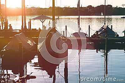 Pier with rent boat on evening on alster shortly before sunset Stock Photo