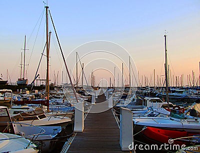The pier. Yachts. Sunset. Stock Photo