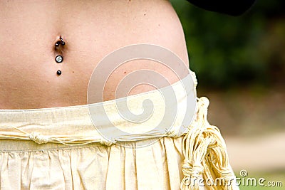 Pierced abdomen Stock Photo