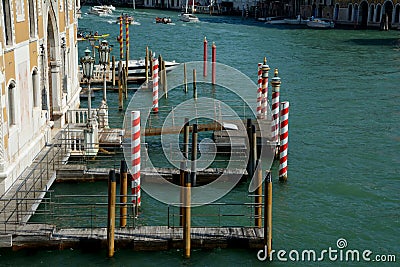 Piers and mooring piles in Venice, Italy Editorial Stock Photo