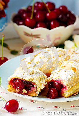 Pies from puff pastry with cherry Stock Photo