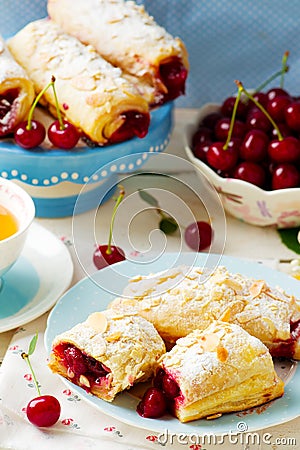 Pies from puff pastry with cherry Stock Photo