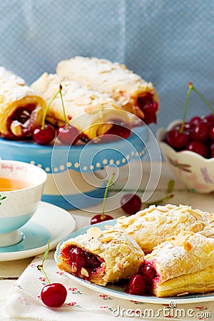 Pies from puff pastry with cherry Stock Photo