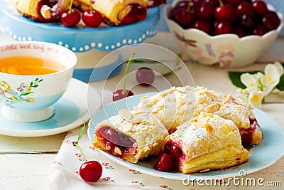 Pies from puff pastry with cherry Stock Photo