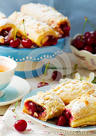 Pies from puff pastry with cherry Stock Photo