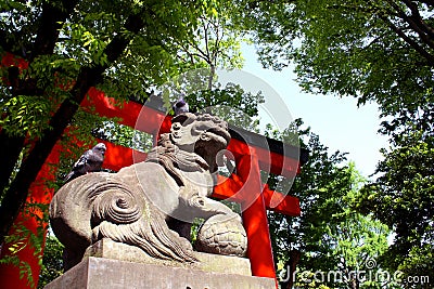 Pigeons on Lion Statue Stock Photo