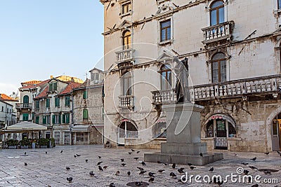 Pigeons and a statue in Split Editorial Stock Photo