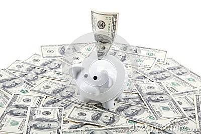 Piggy Bank on the background of a stack of dollar bills Stock Photo