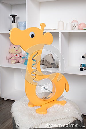 Piggy Bank for children in the form of a giraffe Stock Photo