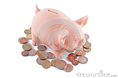 Piggy bank and coins Stock Photo