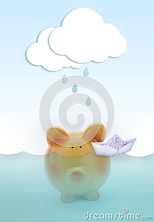 Piggy bank drowning in water, with paper boat Stock Photo