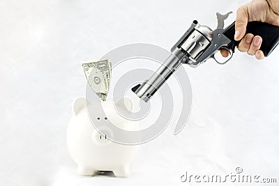 Piggy Bank at Gunpoint Stock Photo