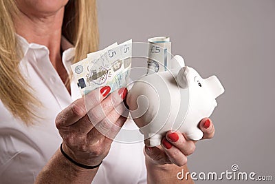 Piggy bank and new banknotes Editorial Stock Photo