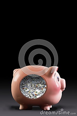 Piggy full of Cash. Stock Photo