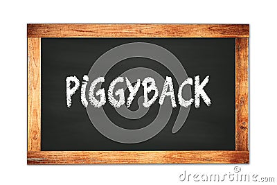 PIGGYBACK text written on wooden frame school blackboard Stock Photo