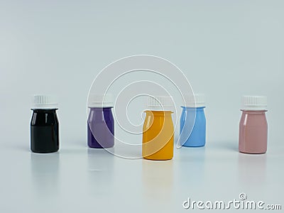 pigment resin paint in the bottle, many colors there are purple, pink, blue, orange, and black Stock Photo