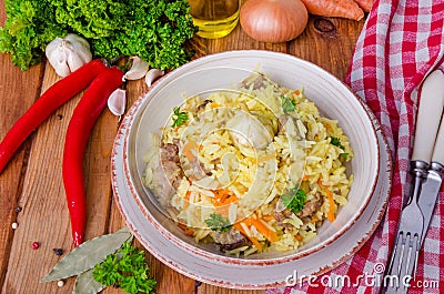 Pilaf. Rice with meat, vegetables and spices Stock Photo