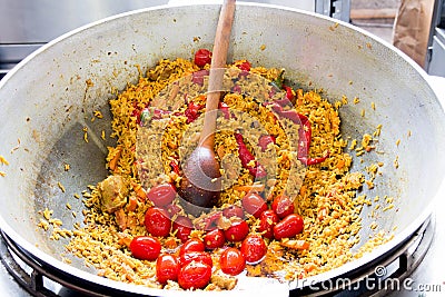 Pilaf with tomatoes. Stock Photo