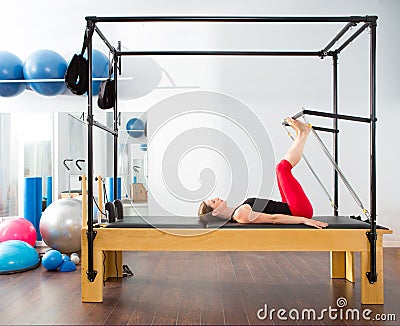 Pilates aerobic instructor woman in cadillac Stock Photo