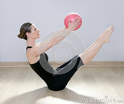 Pilates woman stability ball gym fitness yoga Stock Photo