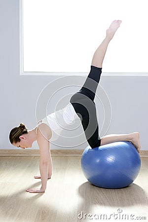 Pilates woman stability ball gym fitness yoga Stock Photo