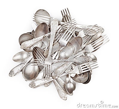 Pile of aged vintage silver cutlery Stock Photo