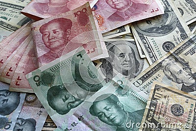 A pile of America and China currency Stock Photo